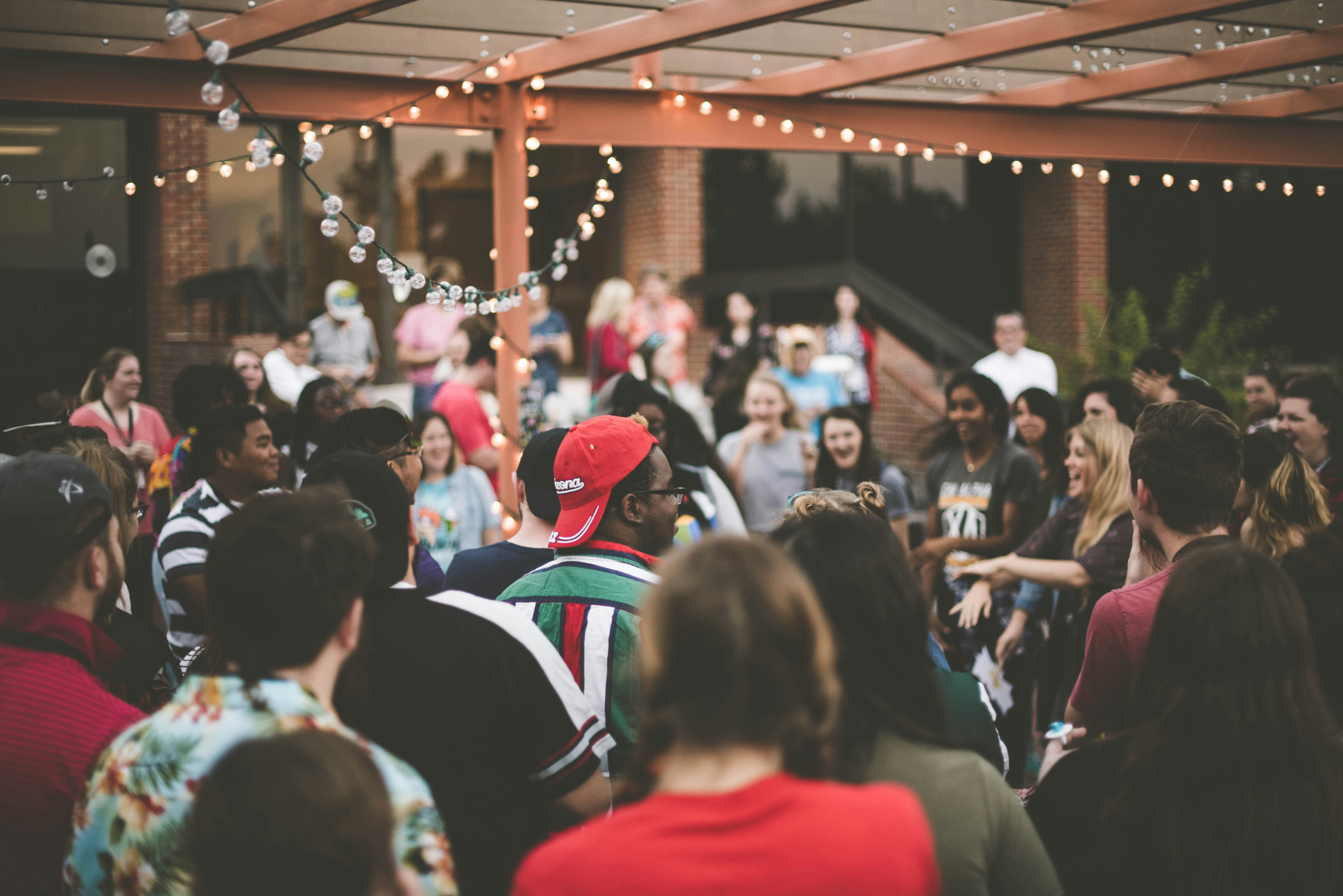 Attendees at a charity gala capturing moments during a nonprofit fundraising event