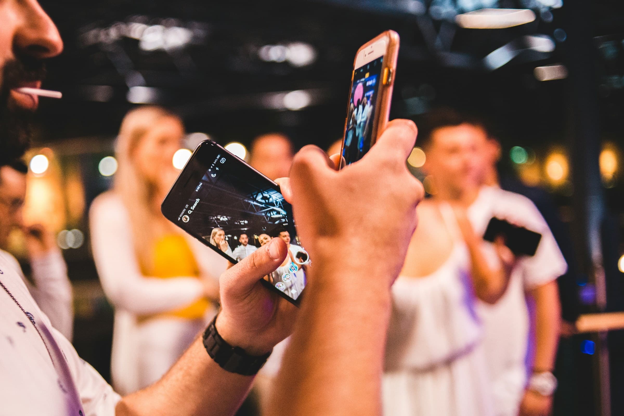 Guests sharing photos at an event with a live gallery preview